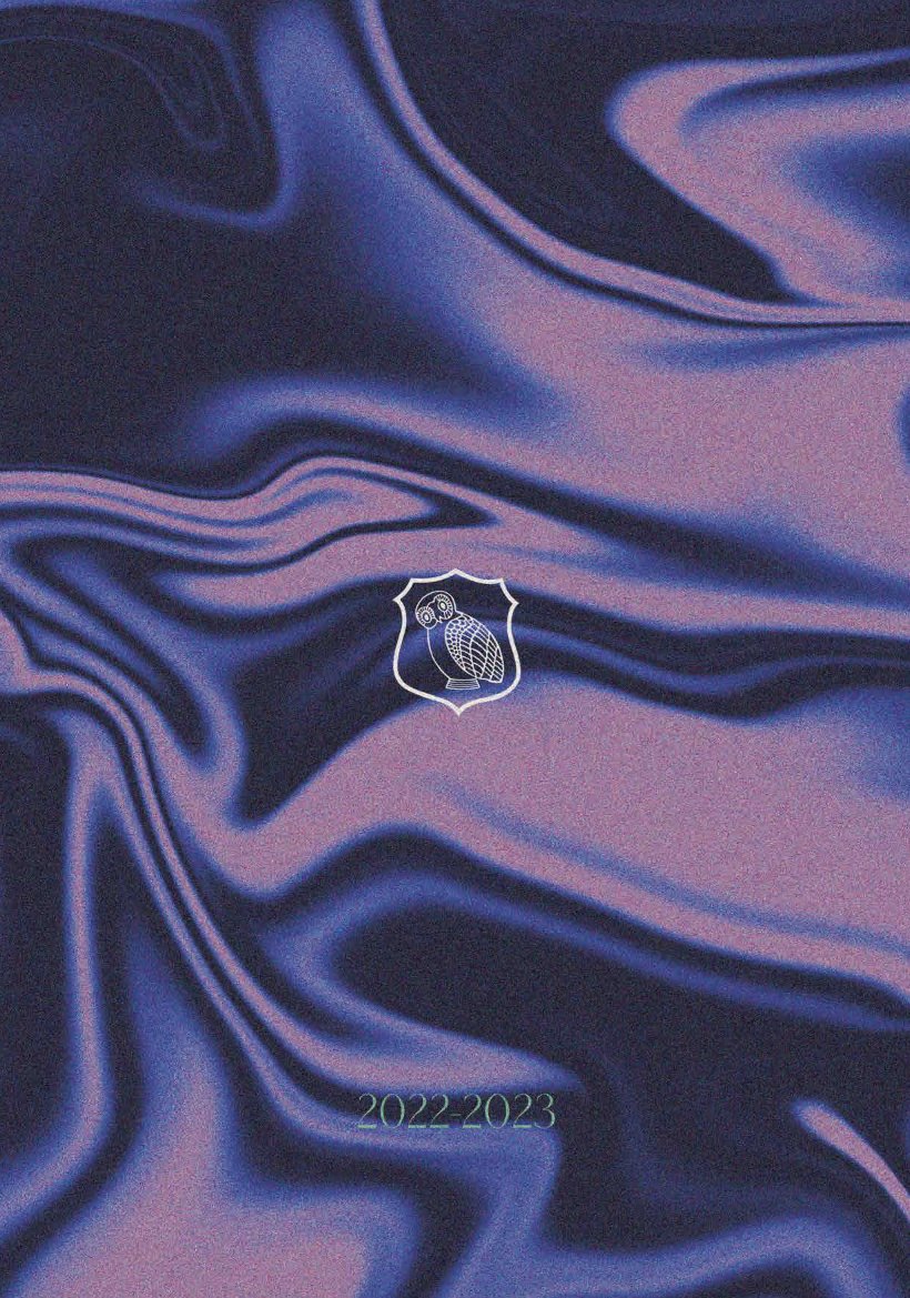 The Suttonian 2022–2023 cover: the Sutton Grammar School owl crest on swirling violet and pink liquid